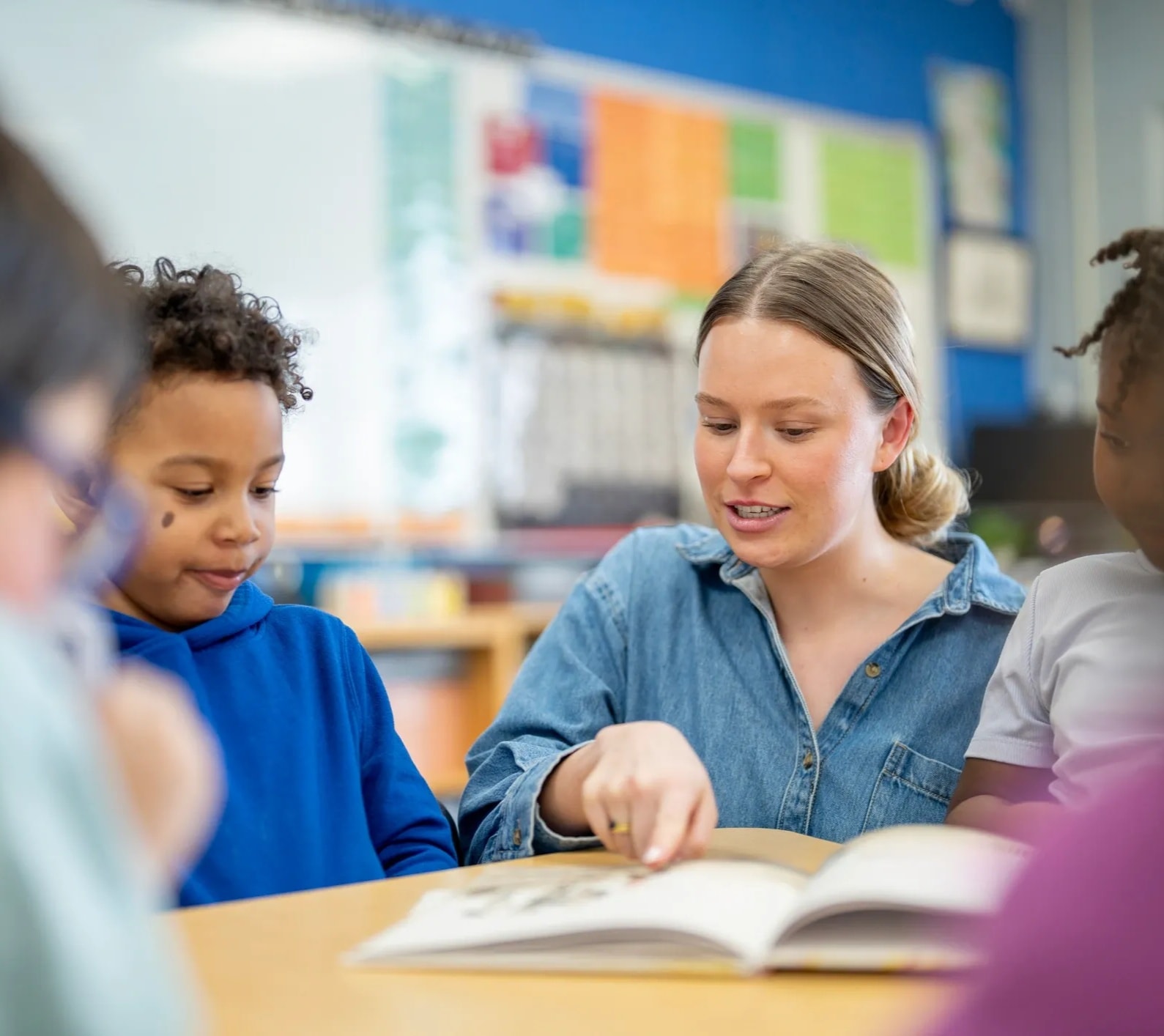 Teacher working with a student during a tutoring session